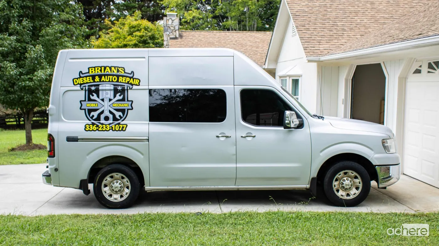 Brian's Diesel & Auto Repair silver van wrap by Adhere